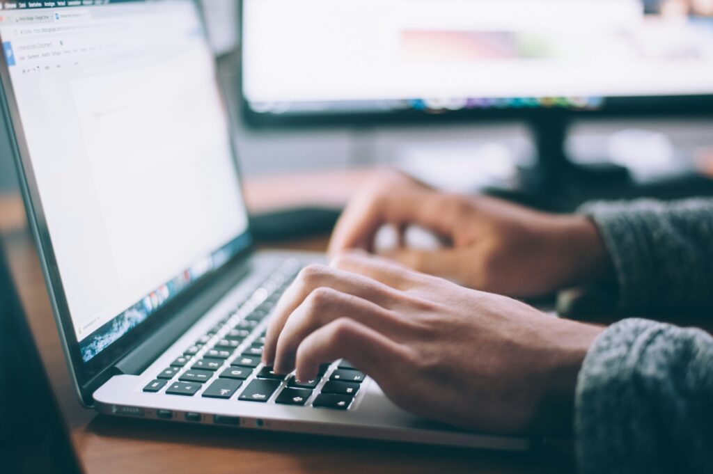 man typing content