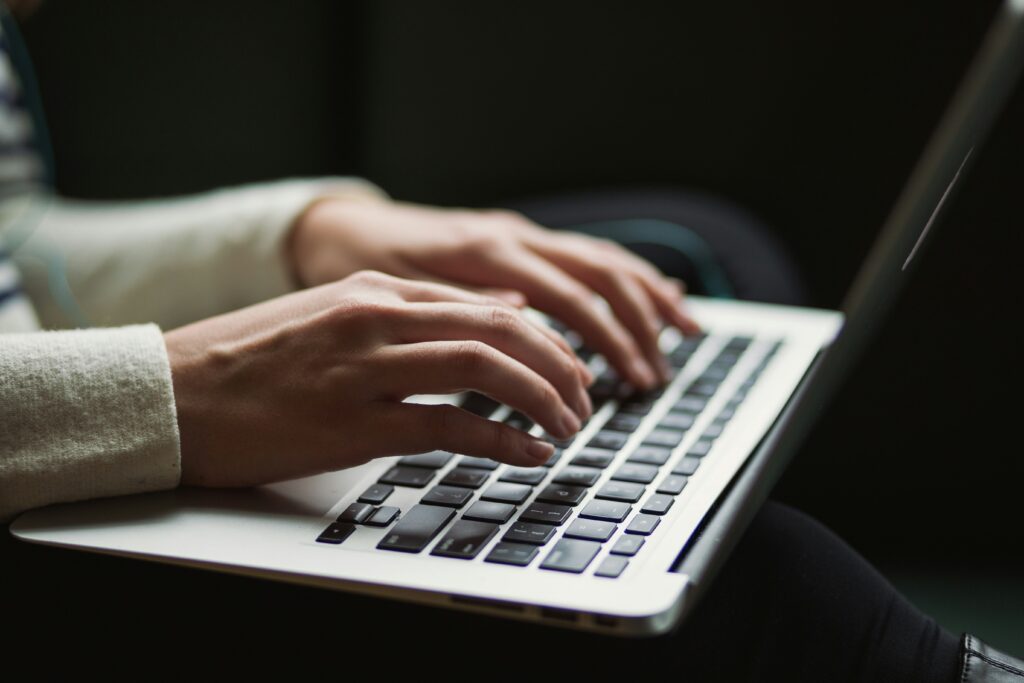 man typing content